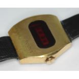 A 1970s gold plated vintage Bulova N5 'Big Block' LED digital wristwatch with leather strap.