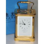 A modern Garrard & Co brass carriage clock with box.