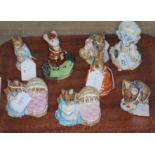 A group of eight Beswick figures including 2 x Hunca Munca, Appley Dapply, Johnny Town Mouse, Lady