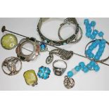 A mixed lot of silver and white metal jewellery including a signet ring, a bangle, a Scottish