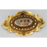 A Victorian yellow metal brooch set with three small diamonds, length 43mm, unmarked, gross wt. 6.