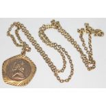 A hallmarked 9ct gold St Christopher medallion on chain marked '375', gross wt. 9.25g.