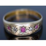 A late Victorian 18ct gold diamond and red stone ring, Chester 1899, gross wt. 1.68g, size M.