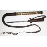 A 19th century colonial officer's leather bound and mother of pearl inlaid riding crop with