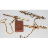 A group of three bar brooches comprising one hallmarked 9ct gold and set with a sunstone miniature