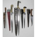 A collection of five Afghan knives and sheaths.