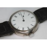 A WWI era hallmarked silver cased trench style wristwatch, with plain white dial and Roman Numerals,