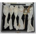 A cased set of six hallmarked silver teaspoons.