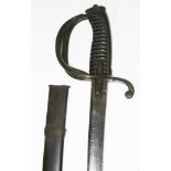 A 19th century cavalry sabre with etched curved blade, brass hilt and twist wire bound grip,