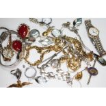A mixed lot including a ladies silver wristwatch and three other ladies wristwatches, silver and