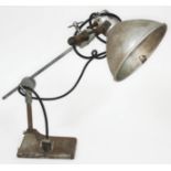 An industrial style angle lamp.