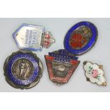 A group of three hallmarked silver badges, another marked Sterling Silver and one marked 925S.