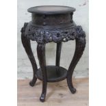 A Chinese carved wood plant stand, height 76cm.