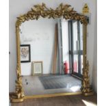 A 19th century large carved and giltwood mirror 172cm x 185cm.