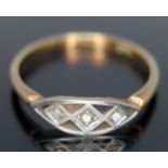 An Art Deco style diamond ring, marked '18ct PLAT', gross wt.2.41g, size R.