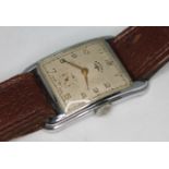 An Art Deco style 15 jewel manual wind Rotary wristwatch in nickel plated case and stainless steel