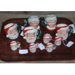 A group of ten small Royal Doulton christmas related character jugs - 3 x Santa Claus D6900, 2 x Mrs