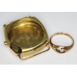 A hallmarked 18ct gold watch case and a ring marked '18ct', wt. 14.03g.