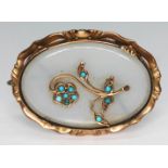 A Victorian/Edwardian agate brooch set with a central turquoise cabochon set flower, length 40mm,