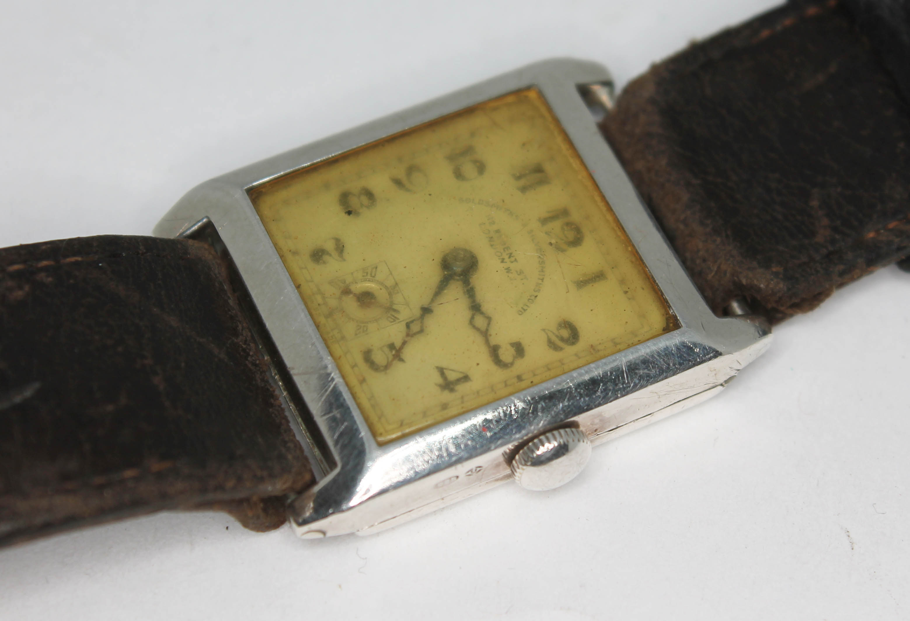 A 1930s Art Deco style hallmarked silver cased 15 jewel manual wind wristwatch, the dial signed