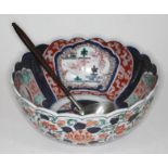 A 19th century Japanese Imari bowl, diam. 27.5cm, and silver plated punch ladle with turned wooden