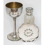 An early Victorian ecclesiastical three piece silver communion set comprising chalice with gothic