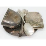 A mixed lot of hallmarked silver comprising a dish, three spoons, a cigarette case and the bottom
