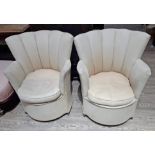 A pair of Art Deco fan back tub chairs.