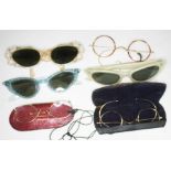 A quantity of vintage spectacles including 1950s ladies fashion sunglasses and gold plated
