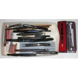 A quantity of pens and pencils including Parker, Swan, Conway, Watermans etc, four with 14ct gold