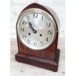 A 1920s arched top mahogany bracket clock, height 31cm.