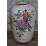 A West German pottery vase decorated with flowers, height 41cm.