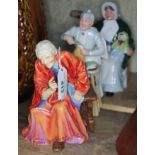 A group of three figures - Royal Doulton A Penny's Worth HN2408, and The Rag Doll Seller HN 2944;