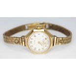 A ladies Cyma hallmarked 9ct gold wristwatch, gross wt. 21.20g.