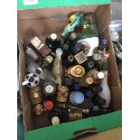 A box of drinks miniatures and flasks