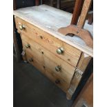 A pine chest of drawers