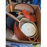 A box of Le Creuset cookware