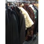 4 fur coats, a shrug, 2 vintage capes, a Windsmoor wool coat, a parka type jacket, a blouse and a