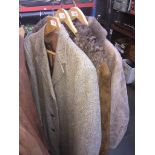 2 sheepskin coats and a wool ladies jacket.