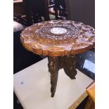 A carved inlaid table