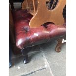 An oxblood leather Chesterfield foot stool