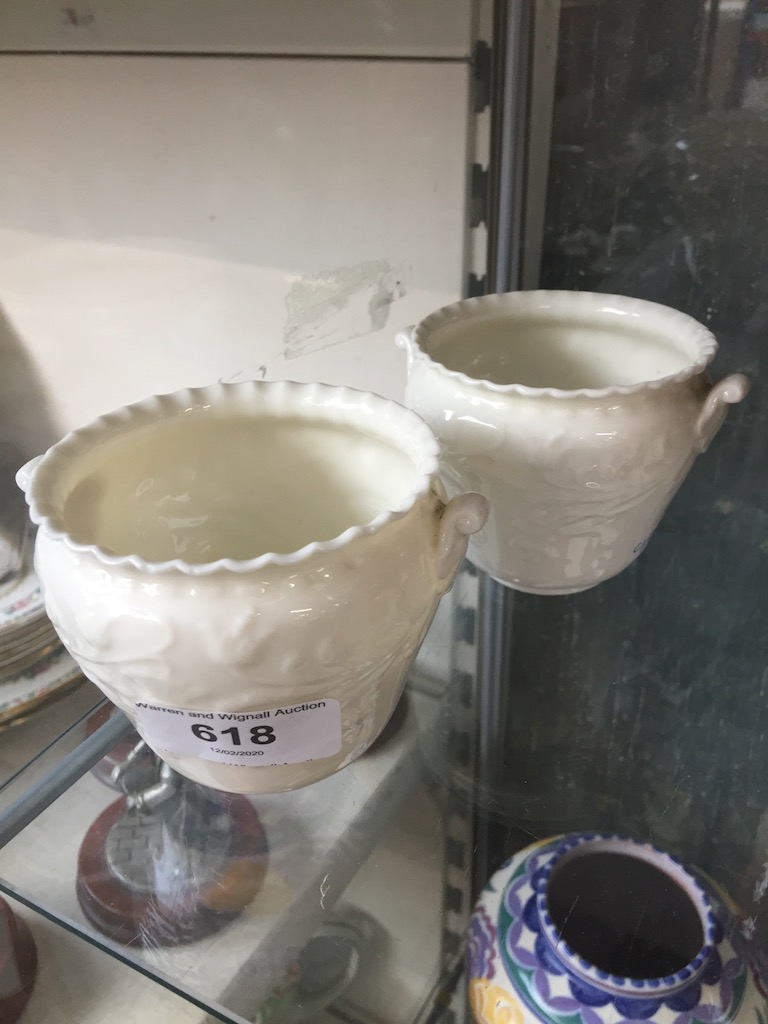 A pair of Royal Worcester small vases