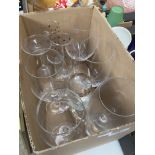 A small box of wine glasses and flutes