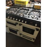 Hotpoint Cannon gas range cooker with tools.