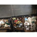 Three boxes of assorted pottery and ornaments.
