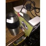 A coffee bean grinder and an electric knife sharpener