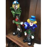 A large and a small Murano glass clowns