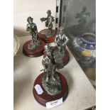 4 pewter figurines including pie seller and sweep