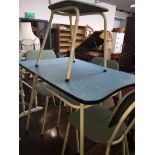 A 1950s formica top table and 4 chairs