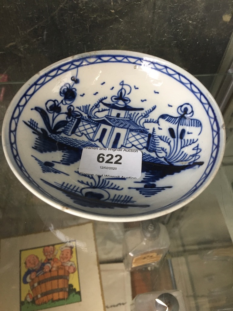 A small oriental design blue and white dish